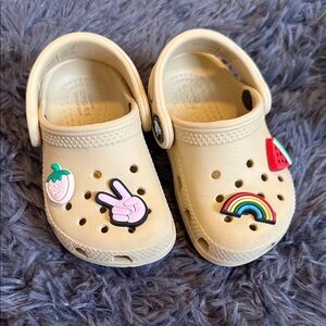 CROCS Kids Cream Clogs with Colorful Charms